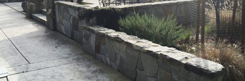 Specializing in beautiful and functional
rock walls and seating features.